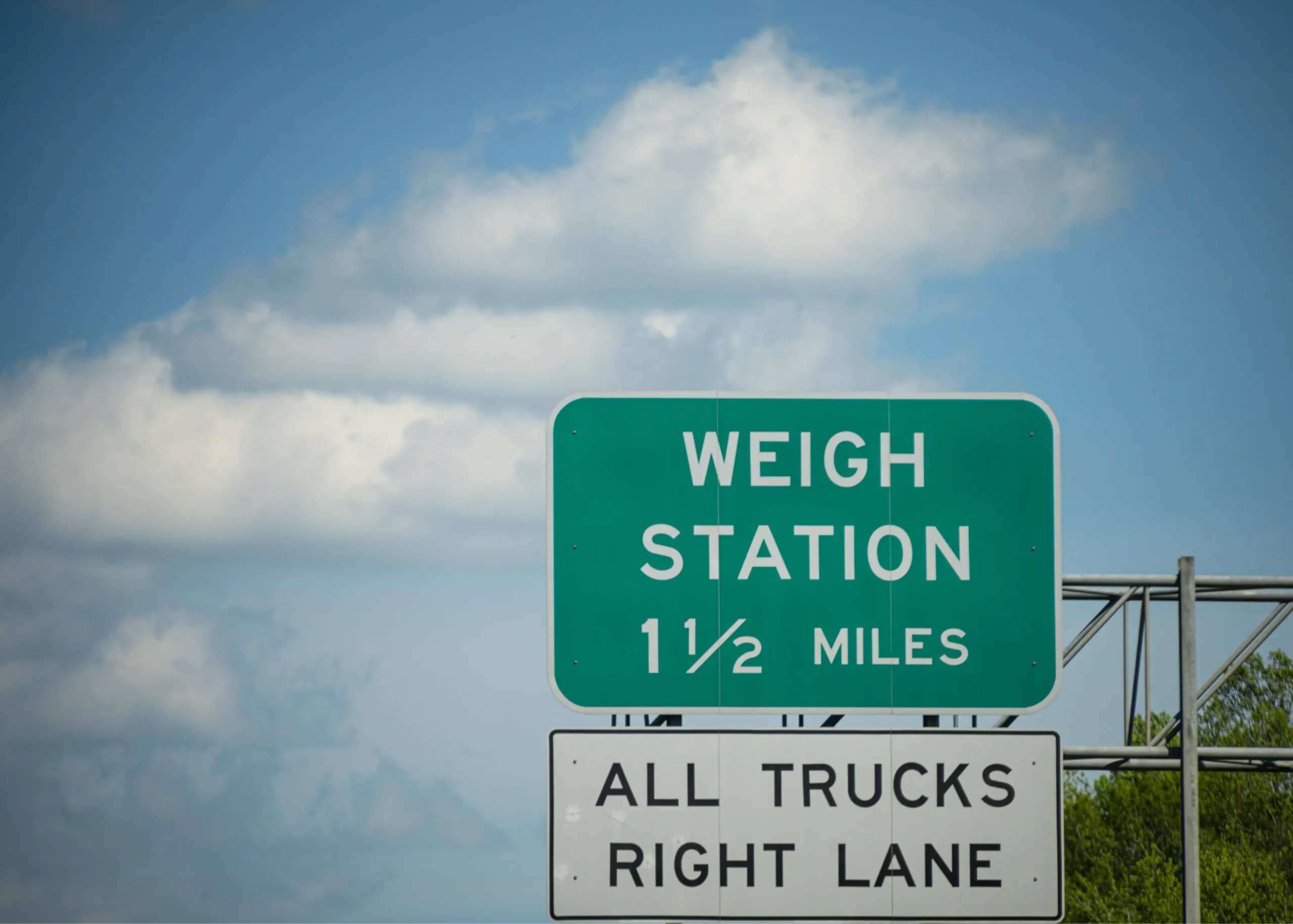 A weigh station sign or get a fine for overweight trucks