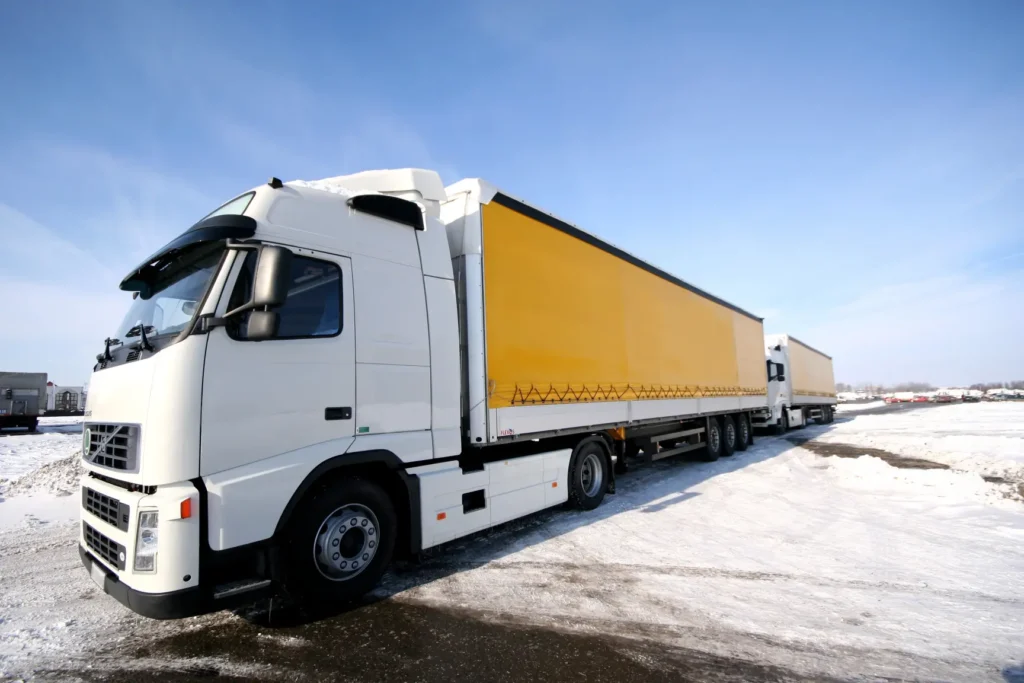 The whole cab in a COE truck is positioned directly above or over the engine and front axle